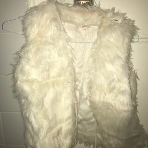 White faux fur vest
